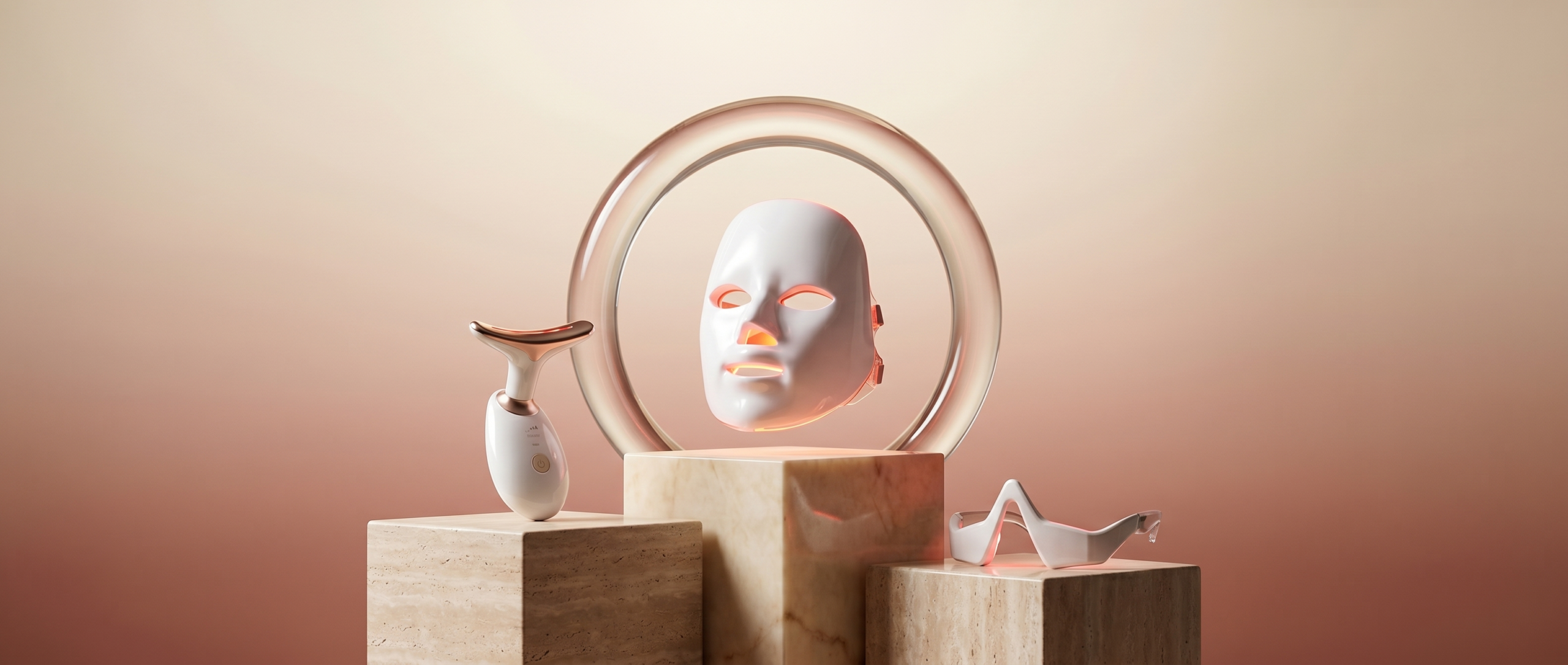 HushHour LED face mask, facial sculptor and under-eye glasses displayed on marble blocks with a soft beige to rose gradient background, hero visual for the HushHour Cosmetics Shopify beauty-tech shop.